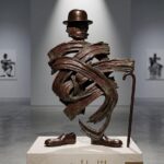 تخطيطي ( تشارلي شابلن ) بقلم الفنان وائل المرعب  ..هكذا حوله الذكاء الاصطناعي إلى نصب برونزي!!!